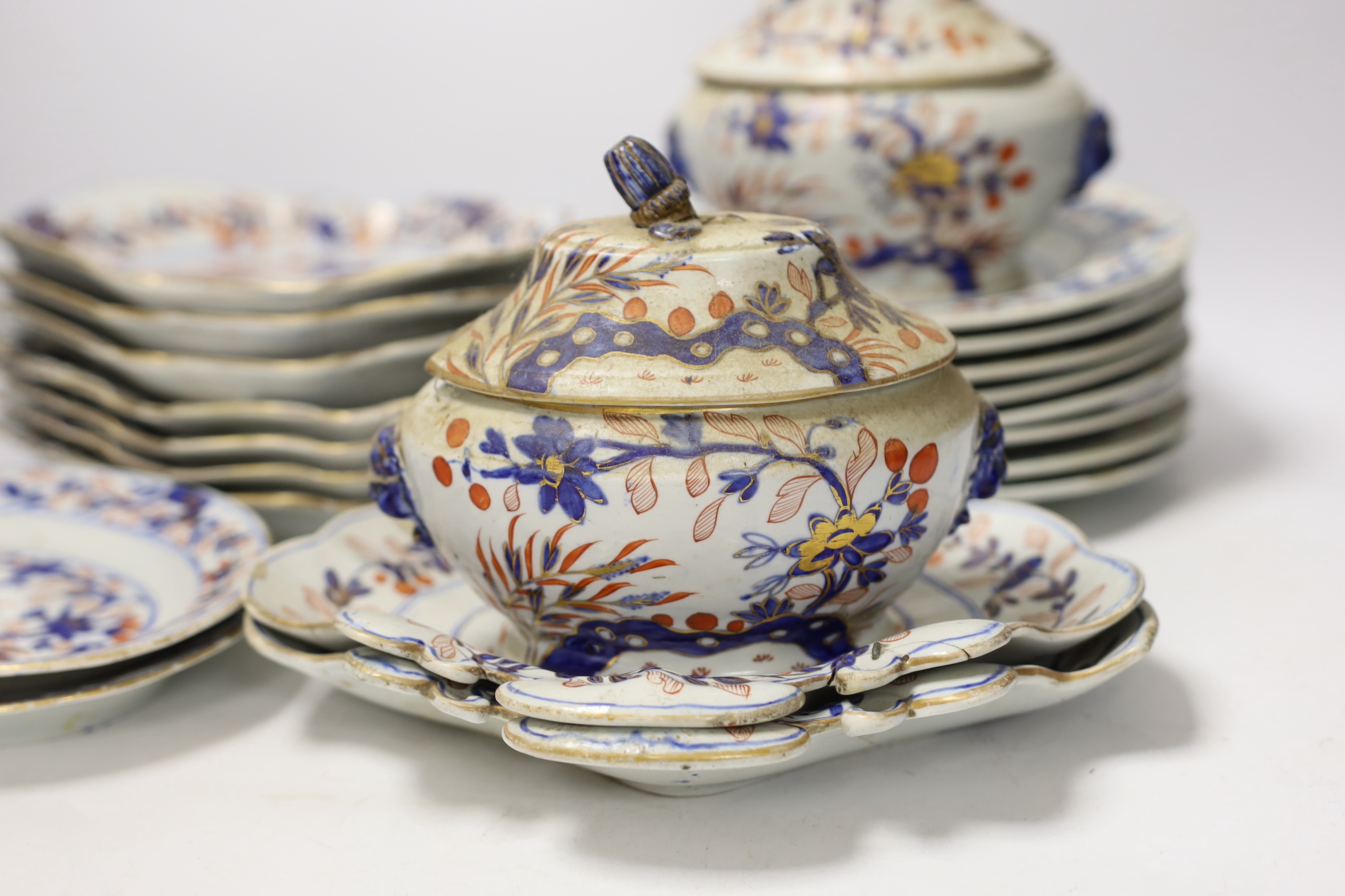 A Mason’s ironstone Japan pattern part dessert service, c.1815-20, including two lidded serving dishes, eight plates and eleven shaped dishes of various sizes, largest 29cm